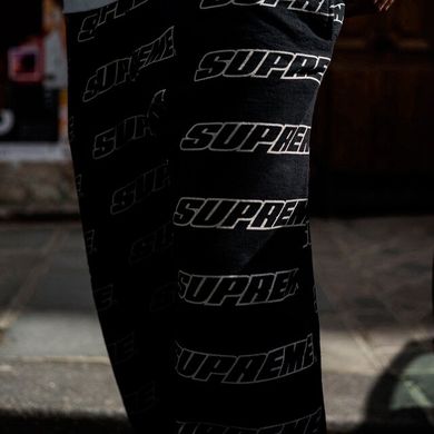 Черные принтованные спортивные штаны SUPREME