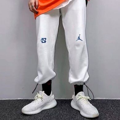 Белые спортивные штаны на шнурках Air Jordan